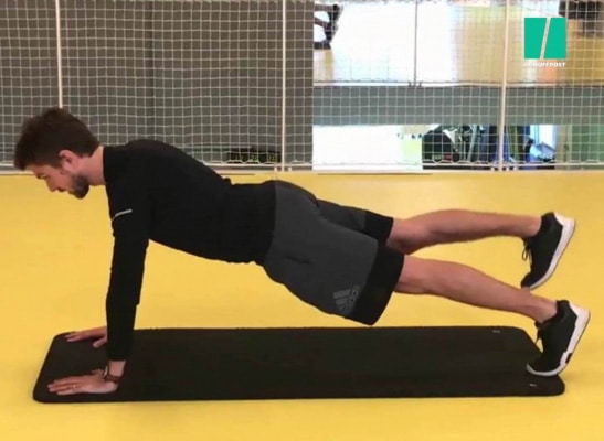 Stéphane Caterina pendant un exercice de renforcement musculaire